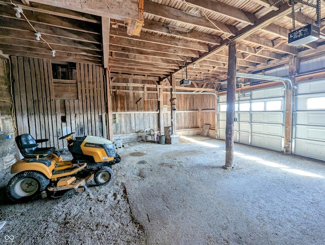 garage featuring a garage door opener