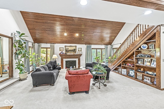 living room with carpet, wood ceiling, stairs, vaulted ceiling, and a fireplace