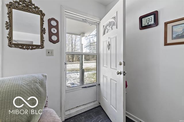 doorway to outside featuring a wealth of natural light