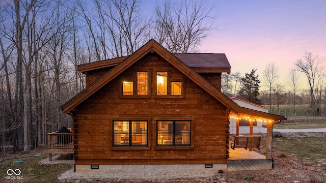 back of property featuring crawl space