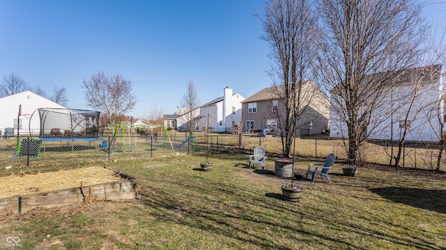 view of yard featuring a residential view and fence