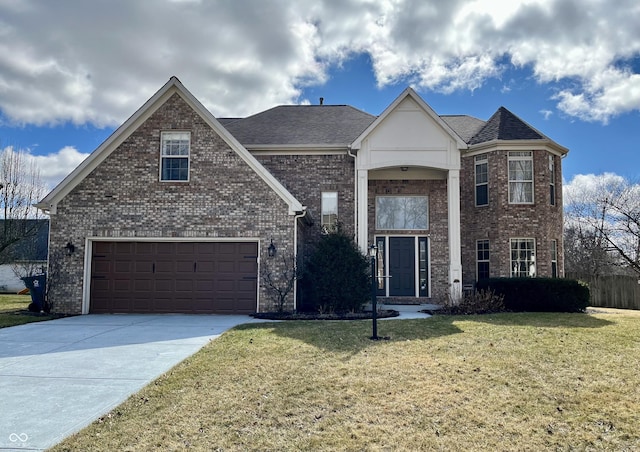 view of front of home with driveway, a shingled roof, a front lawn, a garage, and brick siding