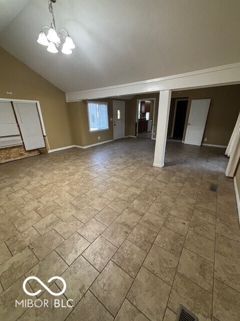 3302 E 42nd St, Indianapolis, IN 46205 - basement with a notable chandelier, visible vents, a textured ceiling, and baseboards
