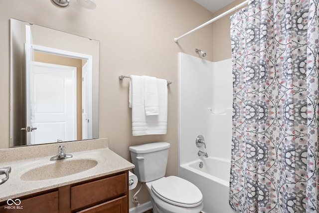 full bath with toilet, vanity, and shower / tub combo with curtain