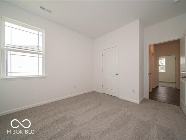 2254 Oakmont Dr, Plainfield, IN 46168 - unfurnished bedroom featuring carpet and baseboards