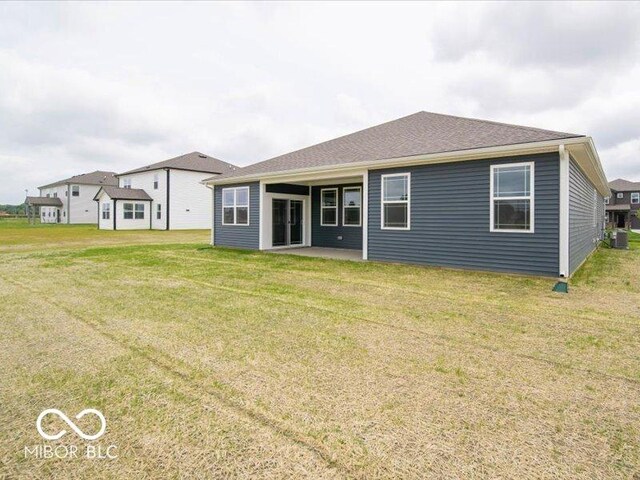 2254 Oakmont Dr, Plainfield, IN 46168 - back of house with a lawn, a patio area, and central AC unit