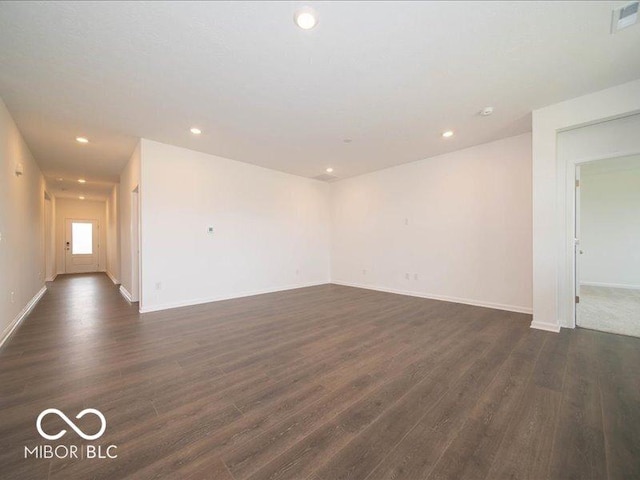 2254 Oakmont Dr, Plainfield, IN 46168 - empty room featuring dark wood finished floors, recessed lighting, and baseboards