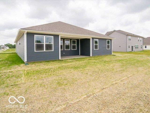 2254 Oakmont Dr, Plainfield, IN 46168 - rear view of property featuring a patio area and a lawn