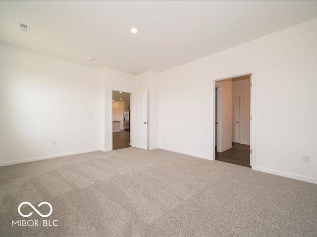 2254 Oakmont Dr, Plainfield, IN 46168 - carpeted empty room with baseboards and recessed lighting