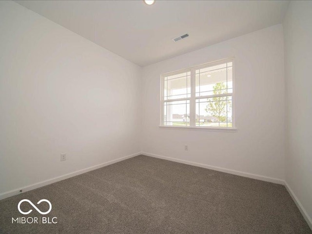 2254 Oakmont Dr, Plainfield, IN 46168 - unfurnished room with dark colored carpet and baseboards