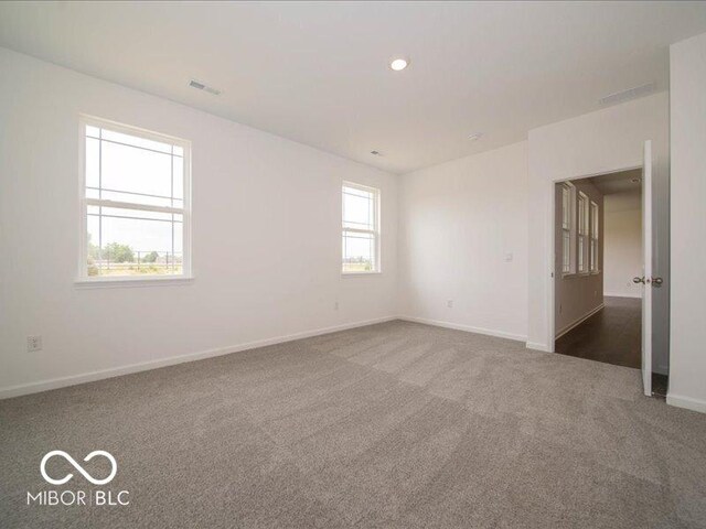 2254 Oakmont Dr, Plainfield, IN 46168 - carpeted empty room featuring baseboards and recessed lighting