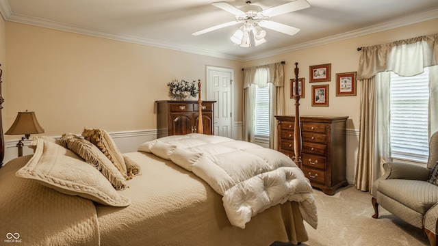 bedroom featuring light carpet, multiple windows, and crown molding