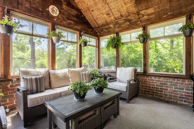 sunroom with lofted ceiling and wood ceiling