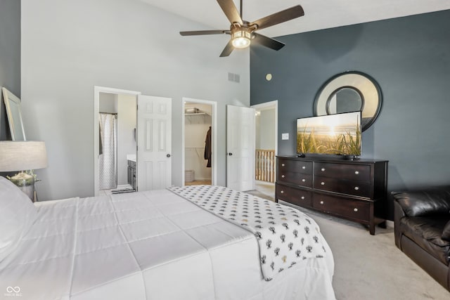 bedroom with visible vents, ceiling fan, high vaulted ceiling, a spacious closet, and carpet flooring