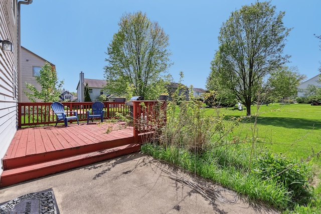 deck featuring a yard