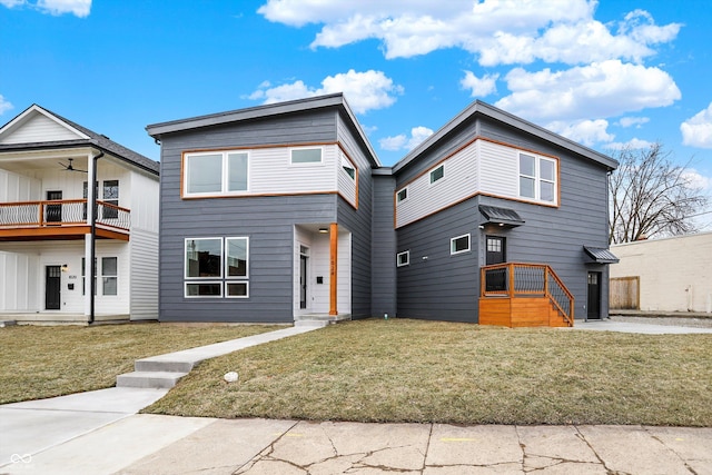 contemporary home featuring a front yard