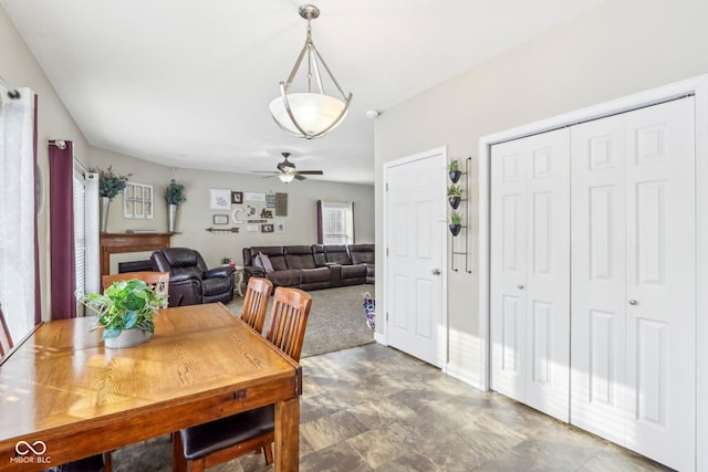 dining space featuring ceiling fan