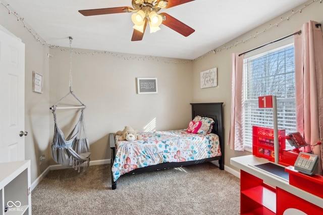 bedroom featuring carpet, baseboards, and ceiling fan