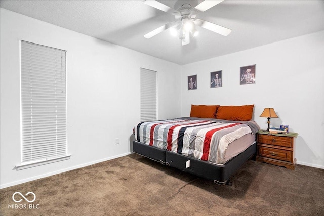 bedroom featuring baseboards, carpet, and ceiling fan