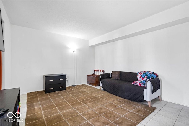 living area featuring tile patterned flooring