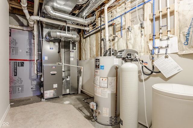 utility room with gas water heater