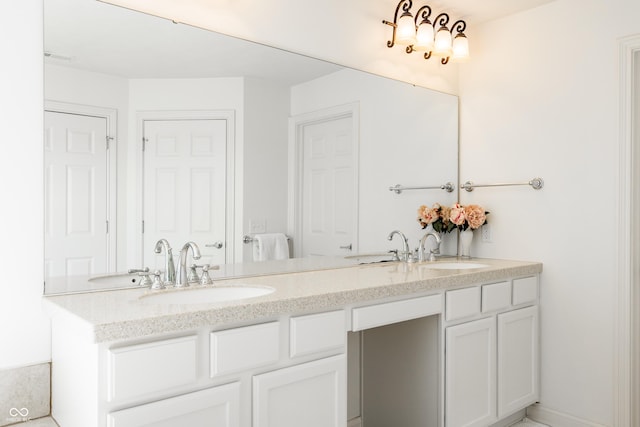 full bathroom with a sink, visible vents, and double vanity