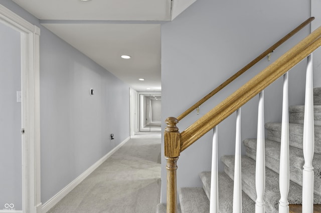 stairway featuring recessed lighting, baseboards, and carpet floors