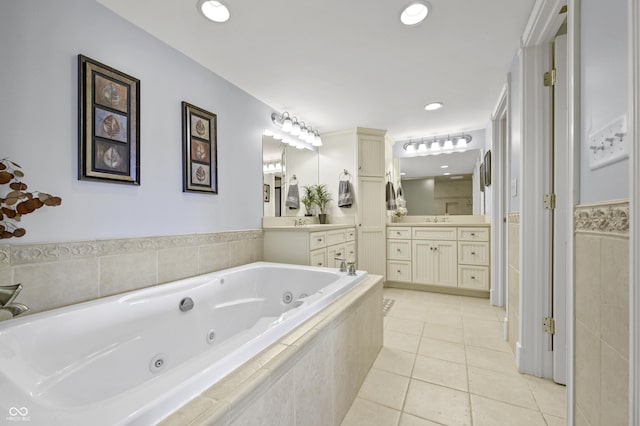 full bathroom featuring tile patterned floors, recessed lighting, vanity, and a whirlpool tub