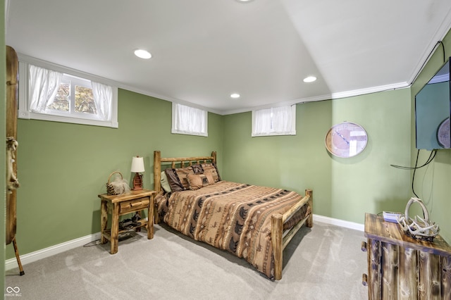 bedroom with baseboards, ornamental molding, and carpet flooring