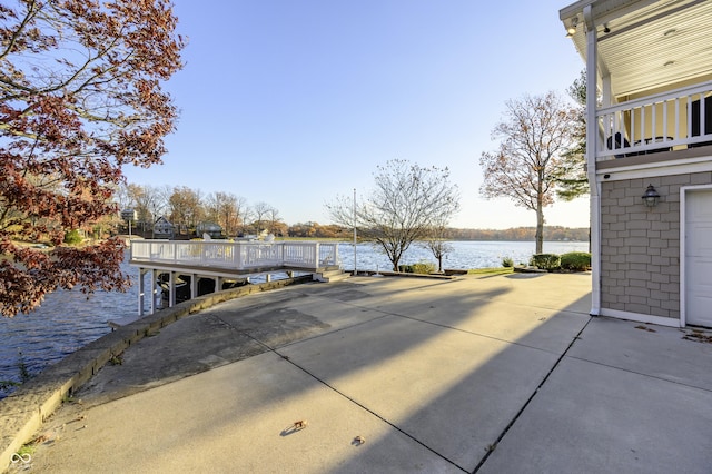 exterior space with a water view