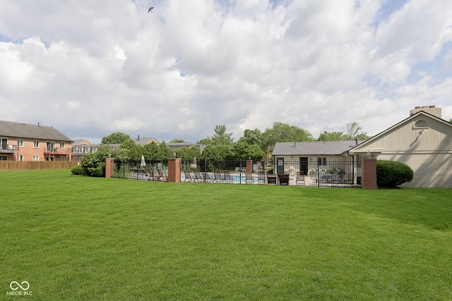 view of yard with fence