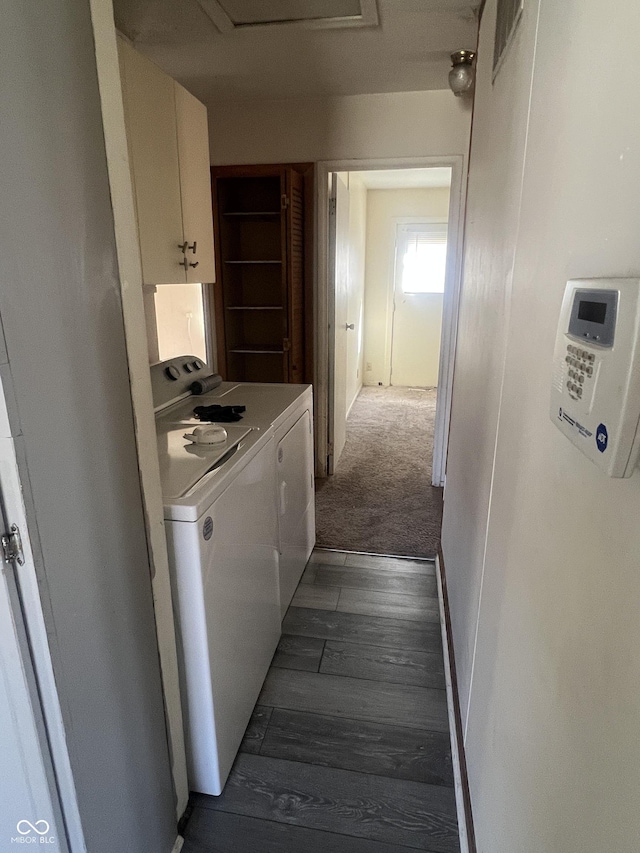 laundry area with washer and clothes dryer, dark wood-style floors, dark carpet, cabinet space, and attic access