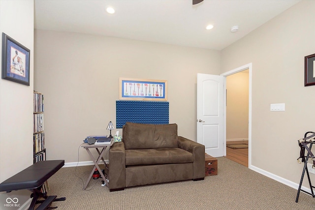 sitting room with recessed lighting, baseboards, and carpet floors