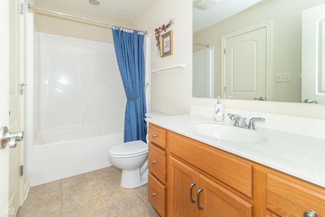 full bathroom with vanity, tile patterned floors, toilet, and shower / bath combo