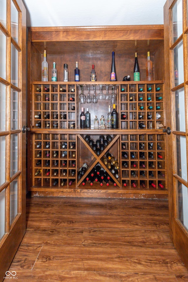 wine area with wood finished floors