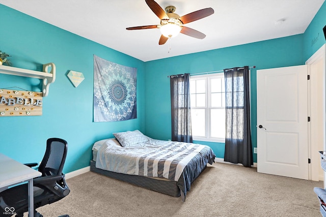 bedroom with baseboards, carpet floors, and ceiling fan