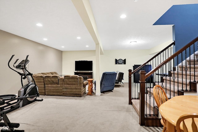 workout area featuring recessed lighting and light colored carpet