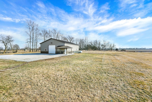 view of yard featuring a garage