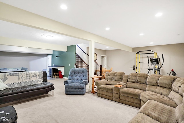 living area featuring recessed lighting, carpet flooring, and stairs