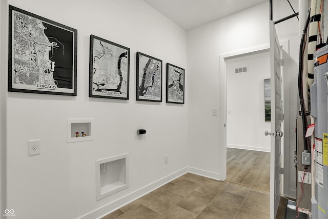 laundry room with visible vents, baseboards, washer hookup, laundry area, and electric dryer hookup