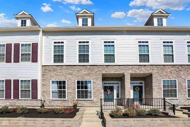 multi unit property with stone siding