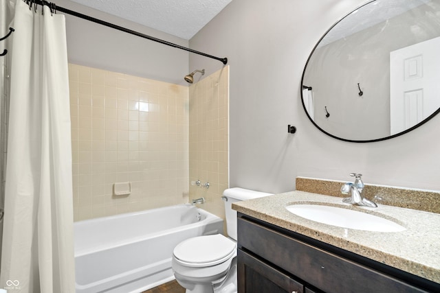 bathroom featuring shower / tub combo, a textured ceiling, vanity, and toilet