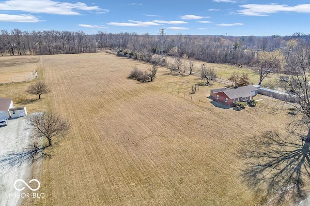 birds eye view of property featuring a rural view