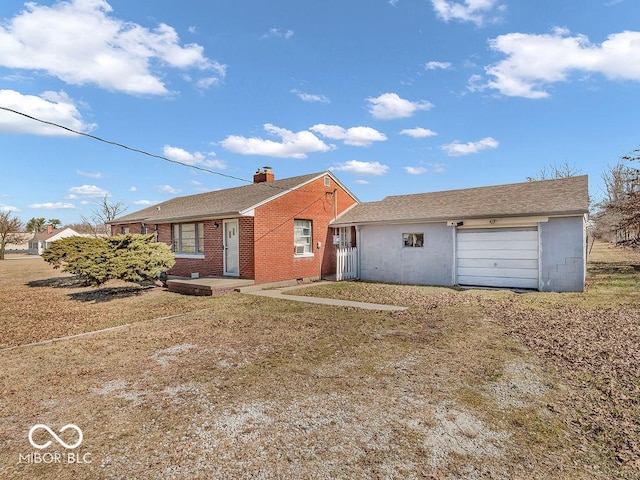 ranch-style home featuring brick siding, an attached garage, a chimney, and driveway