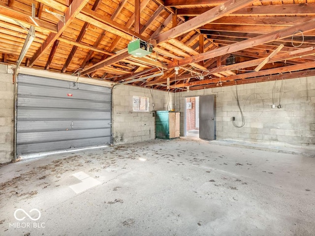 garage featuring a garage door opener