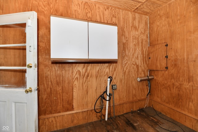 interior details with wooden walls and wood finished floors