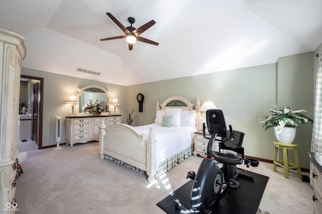 bedroom with baseboards, visible vents, lofted ceiling, and light carpet