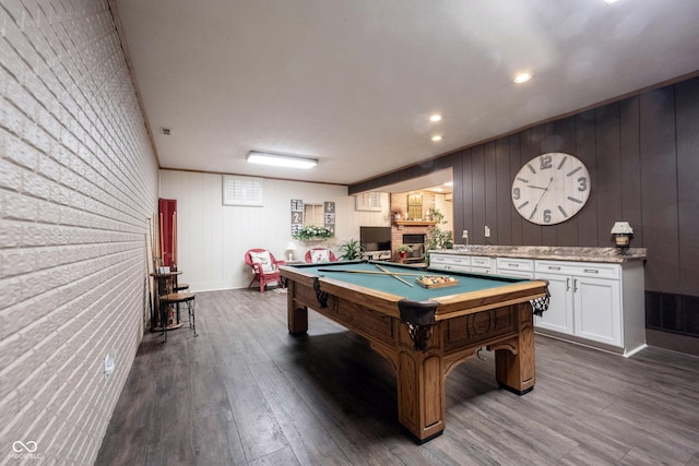 playroom featuring recessed lighting, a fireplace, dark wood-style floors, and billiards