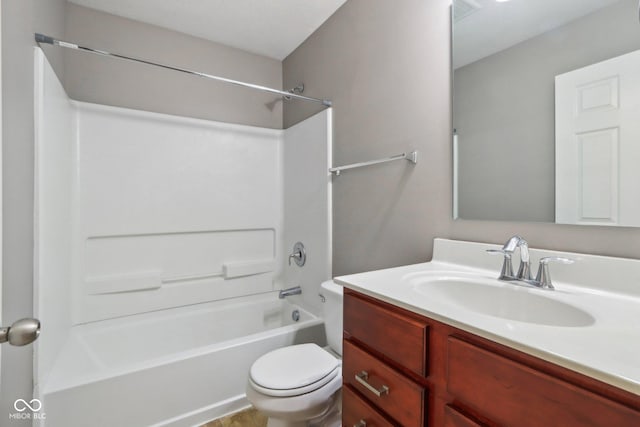 bathroom with vanity, toilet, and washtub / shower combination