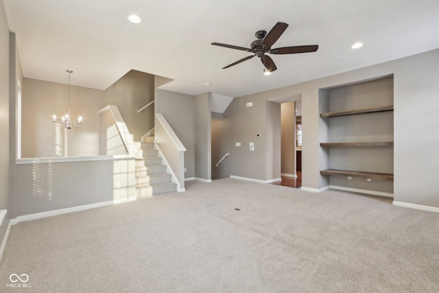 unfurnished living room featuring carpet flooring, recessed lighting, stairs, and baseboards